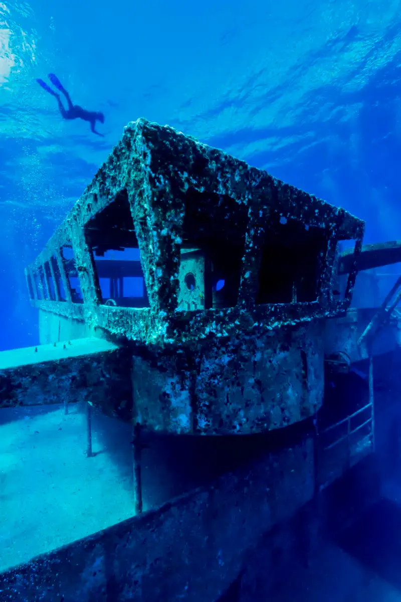 A Freediver Descends To The USS Kittiwake Wall Art