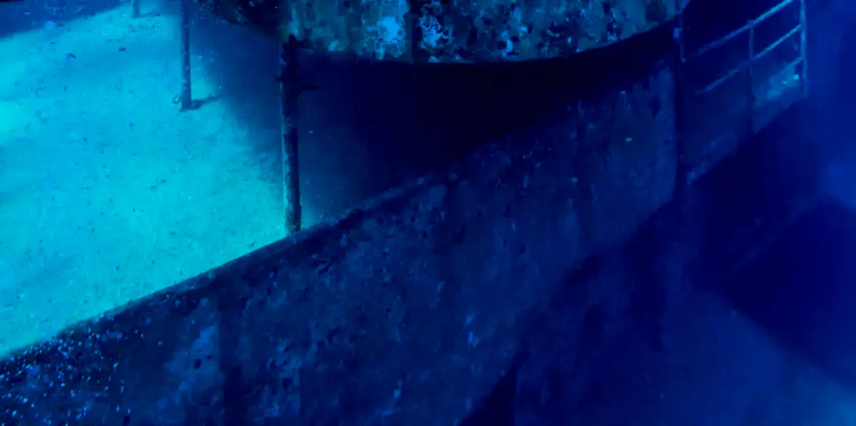 A Freediver Descends To The USS Kittiwake Wall Art