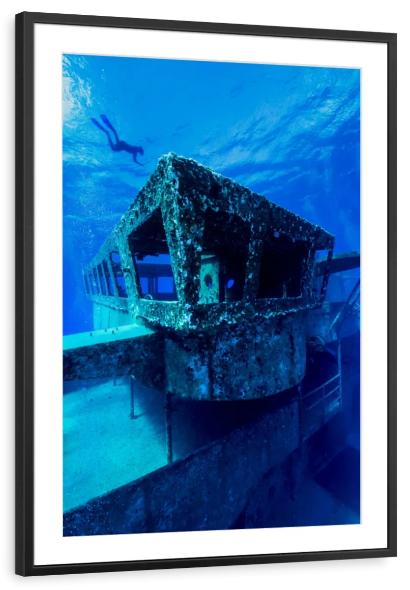 A Freediver Descends To The USS Kittiwake Wall Art